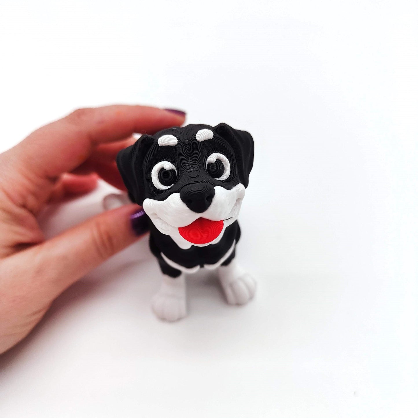 Charming Rottweiler Dog Figurine with Playful Expression, Lifelike Details, and Vibrant Colors – Perfect for Dog Lovers and Collectors
