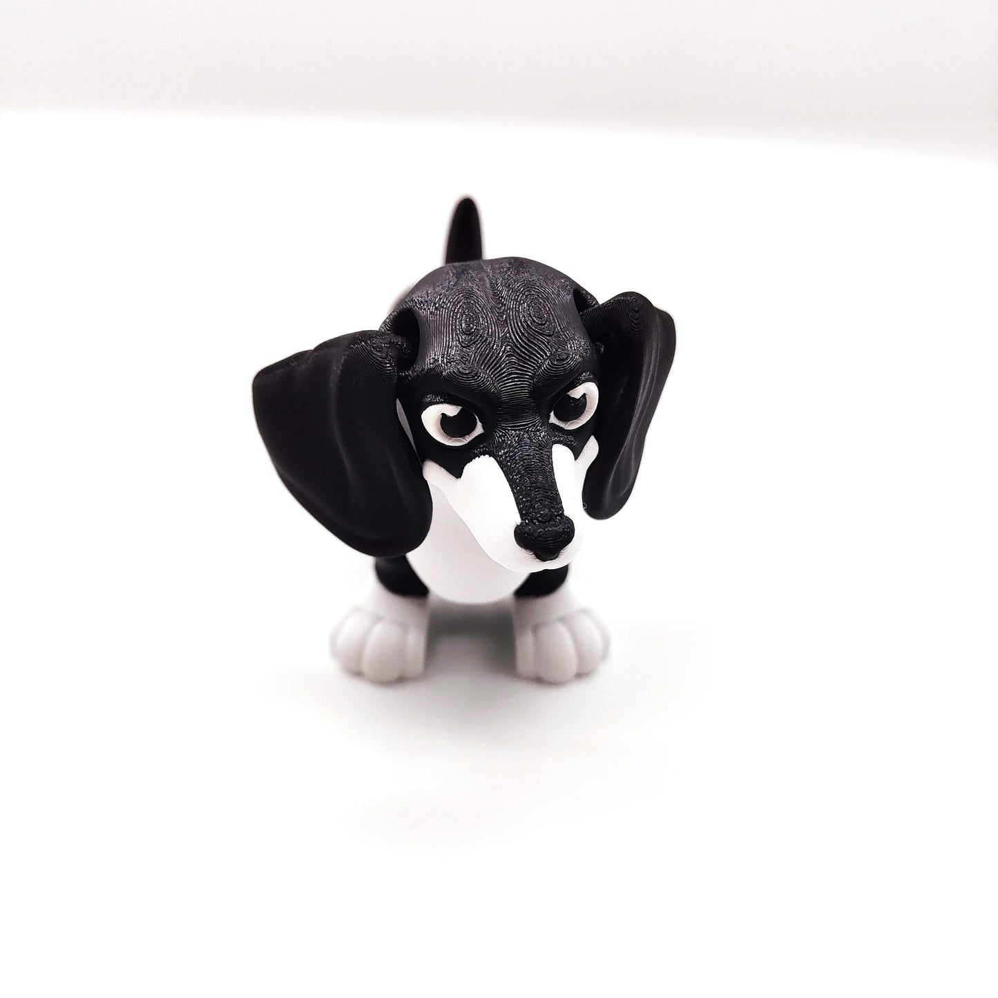 Dachshund Figurine with Expressive Eyes, Perfect for Home Decor, Desk Companion, or Unique Gift for Dog Lovers