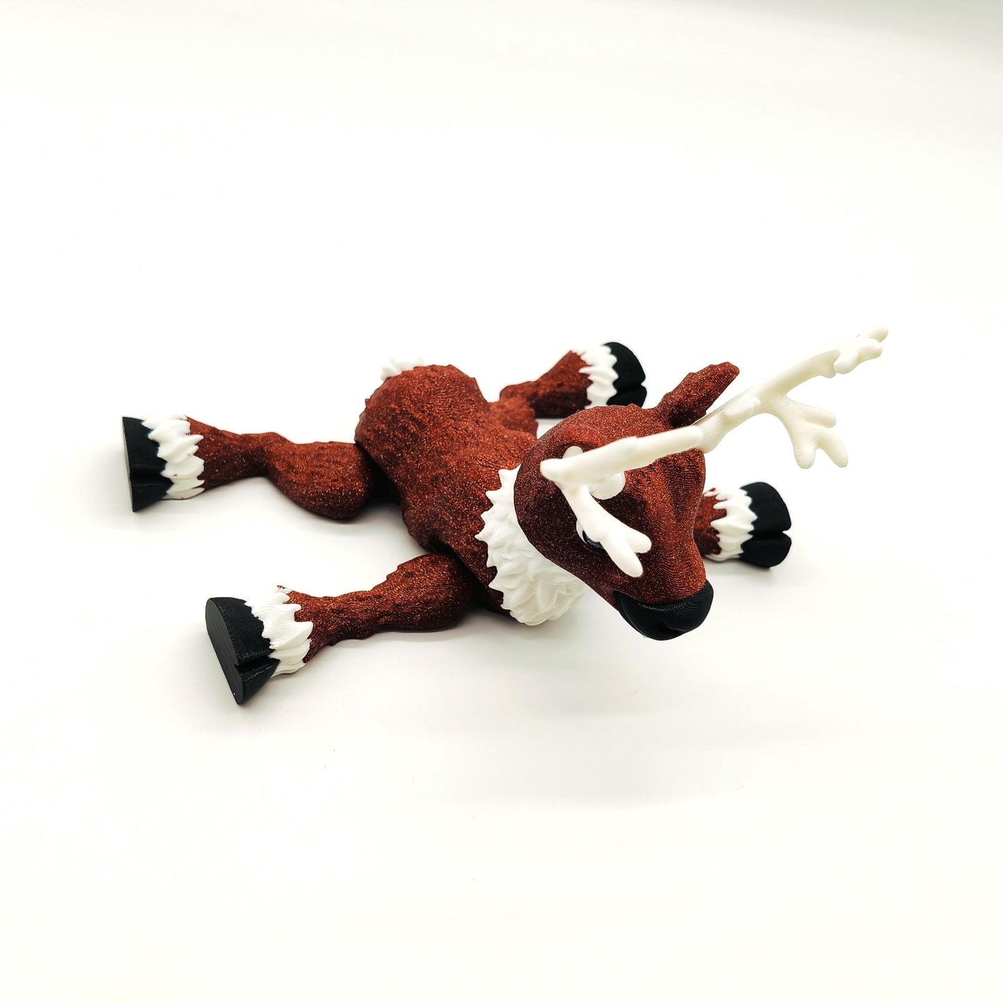 Delightful Articulated Reindeer Figurine Featuring Festive Glitter Finish, Intricate Antlers, and Whimsical Design Perfect for Holiday Decor