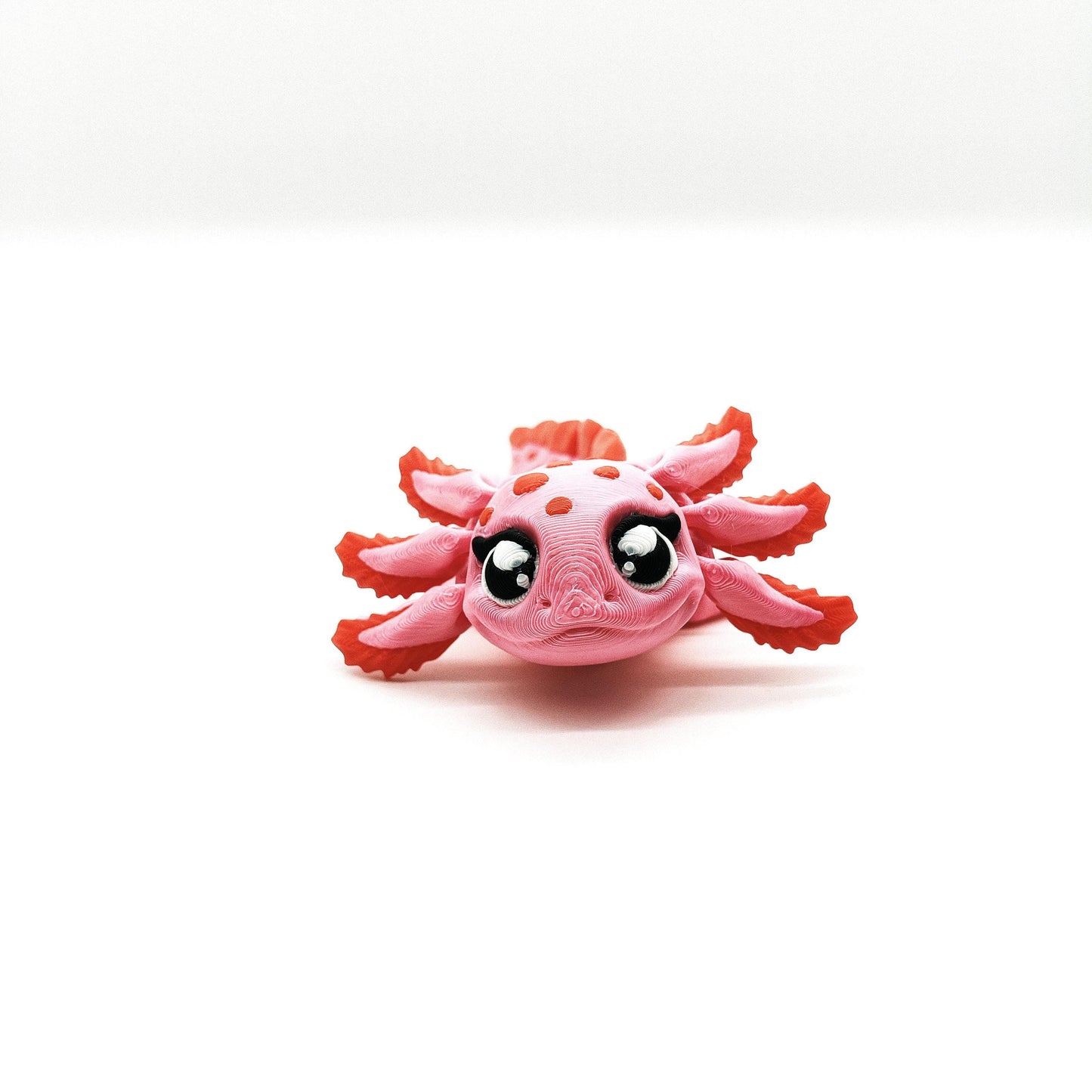 Axolotl-figuur – Roze en rood gevlekte flexibele fidget-axolotl – schattig salamandercadeau voor hem of haar – amfibie verzamelobject voor op het bureau