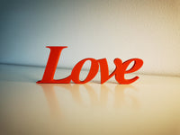 Love word sign, abstract modern design, red, 3D printed, elegant tabledecoration living room, home decor