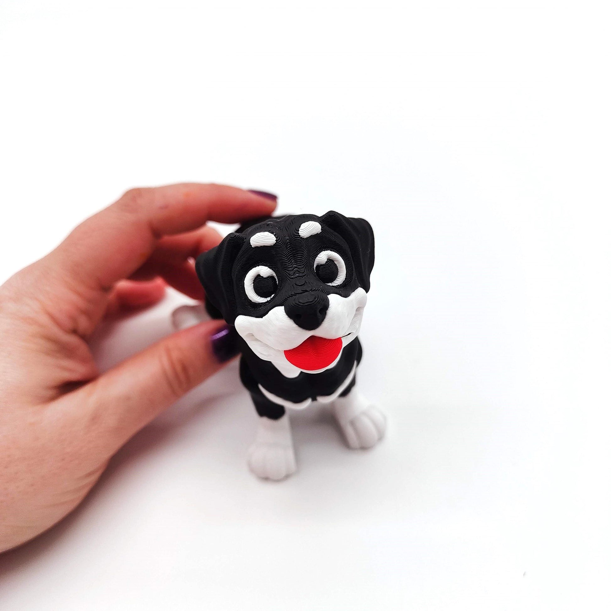Charming Rottweiler Dog Figurine with Playful Expression, Lifelike Details, and Vibrant Colors – Perfect for Dog Lovers and Collectors
