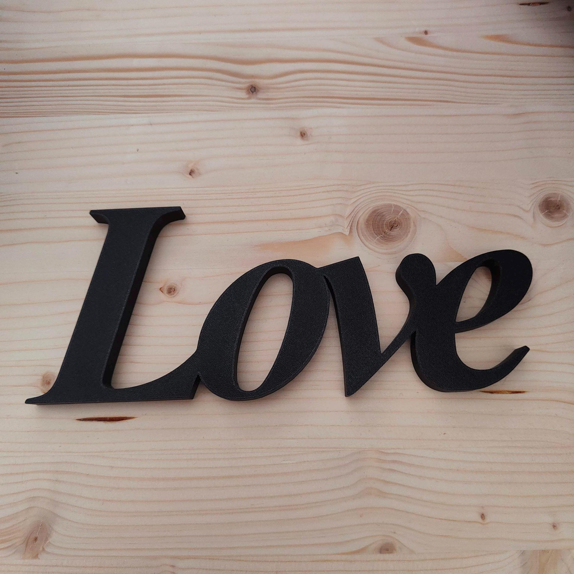 Love word sign, abstract modern design, red, 3D printed, elegant tabledecoration living room, home decor