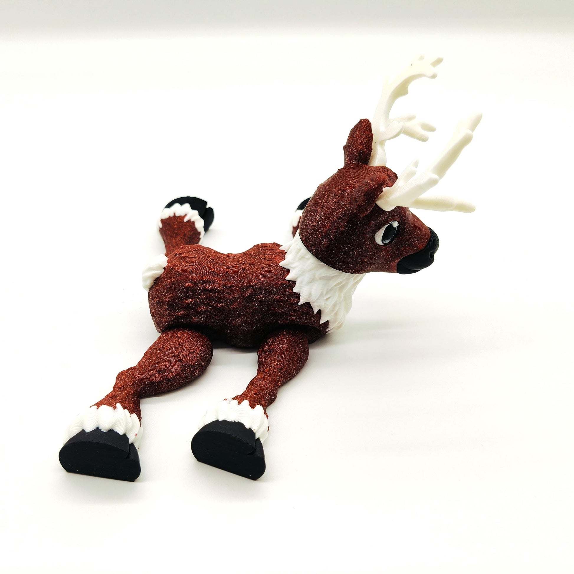 Delightful Articulated Reindeer Figurine Featuring Festive Glitter Finish, Intricate Antlers, and Whimsical Design Perfect for Holiday Decor