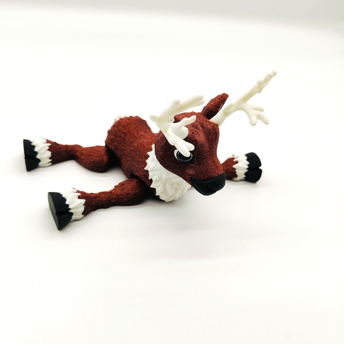 Delightful Articulated Reindeer Figurine Featuring Festive Glitter Finish, Intricate Antlers, and Whimsical Design Perfect for Holiday Decor