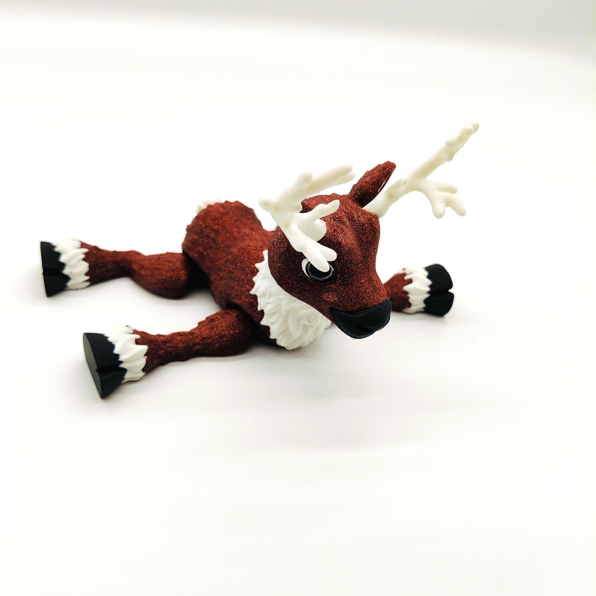 Delightful Articulated Reindeer Figurine Featuring Festive Glitter Finish, Intricate Antlers, and Whimsical Design Perfect for Holiday Decor