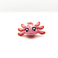 Axolotl-figuur – Roze en rood gevlekte flexibele fidget-axolotl – schattig salamandercadeau voor hem of haar – amfibie verzamelobject voor op het bureau