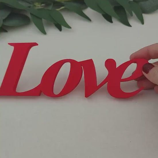 Love word sign, abstract modern design, red, 3D printed, elegant tabledecoration living room, home decor